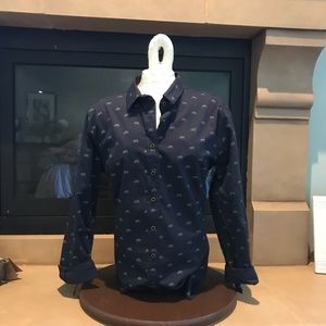 Long sleeve navy button down shirt.